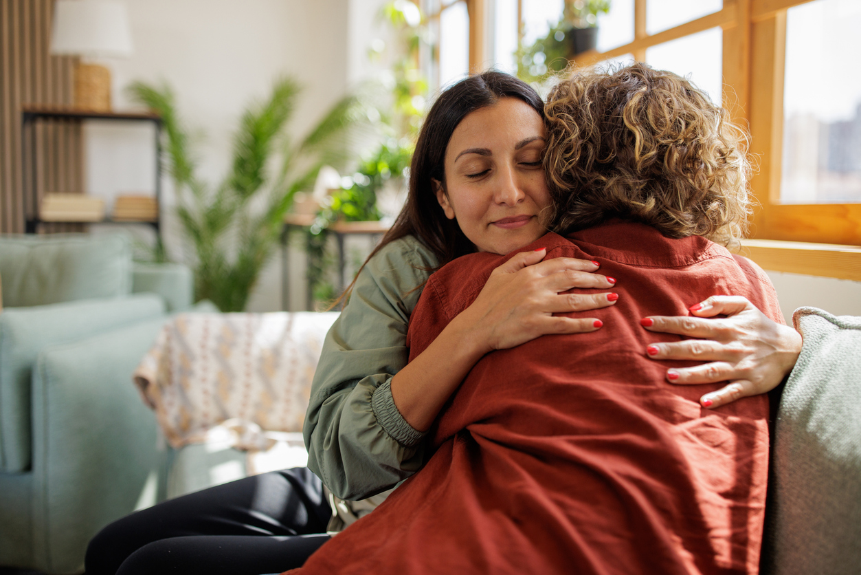 Women supporting each other at home